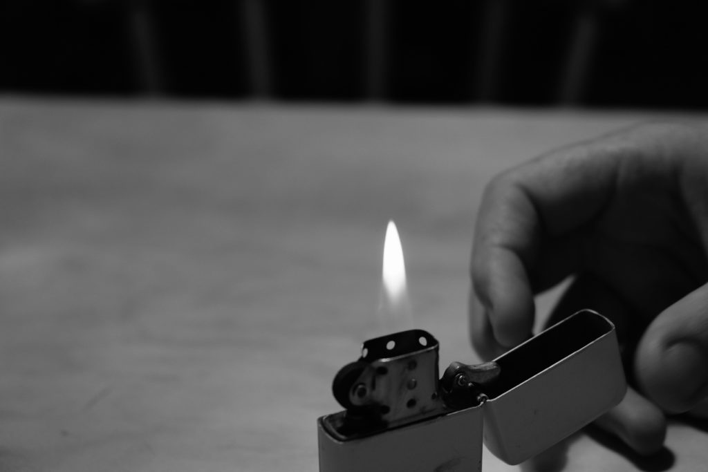 Lighter and man
